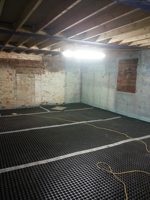 Walls and floor joined with taped seals