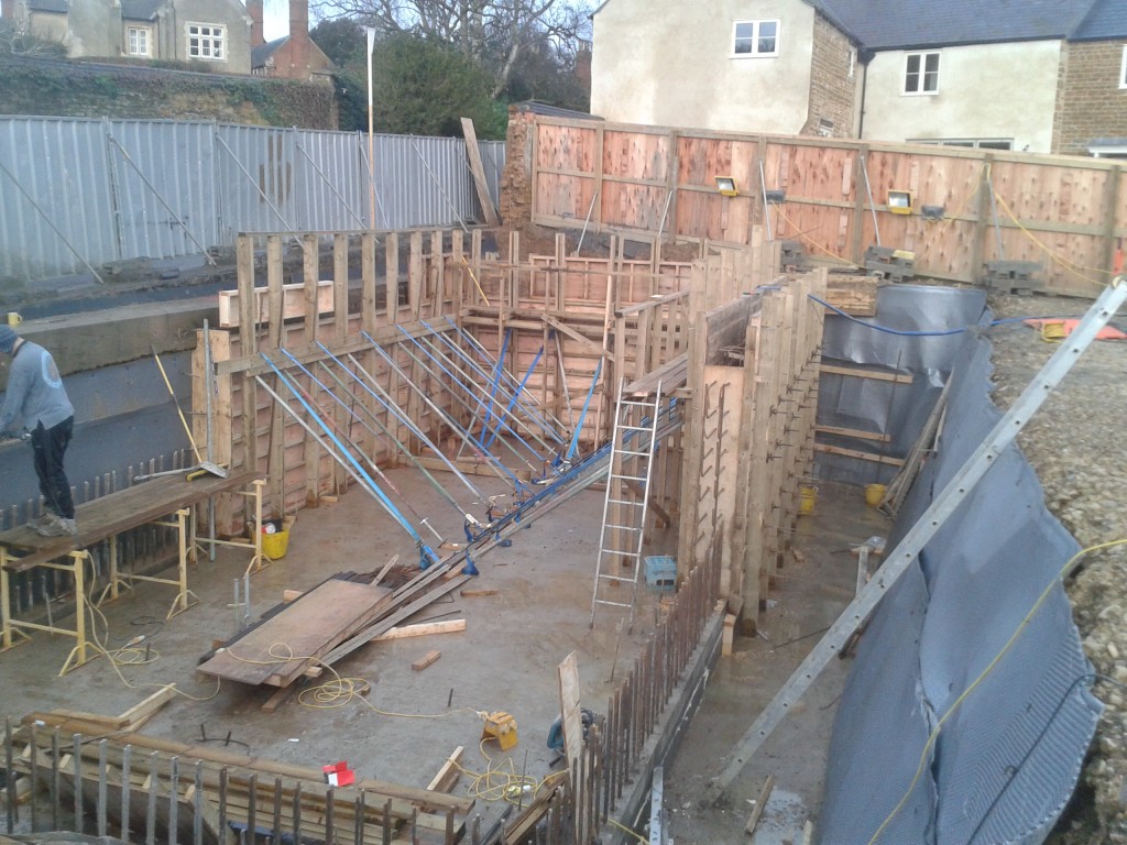Basement walls constructed in two halves
