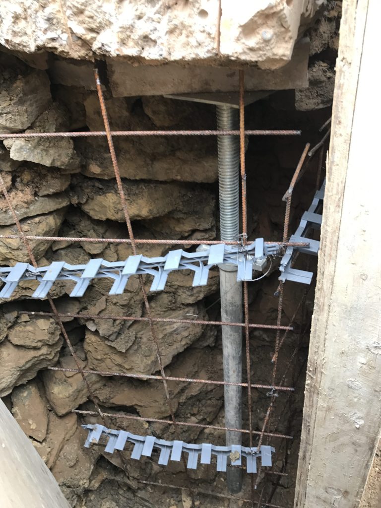 Temporary support for house during excavation