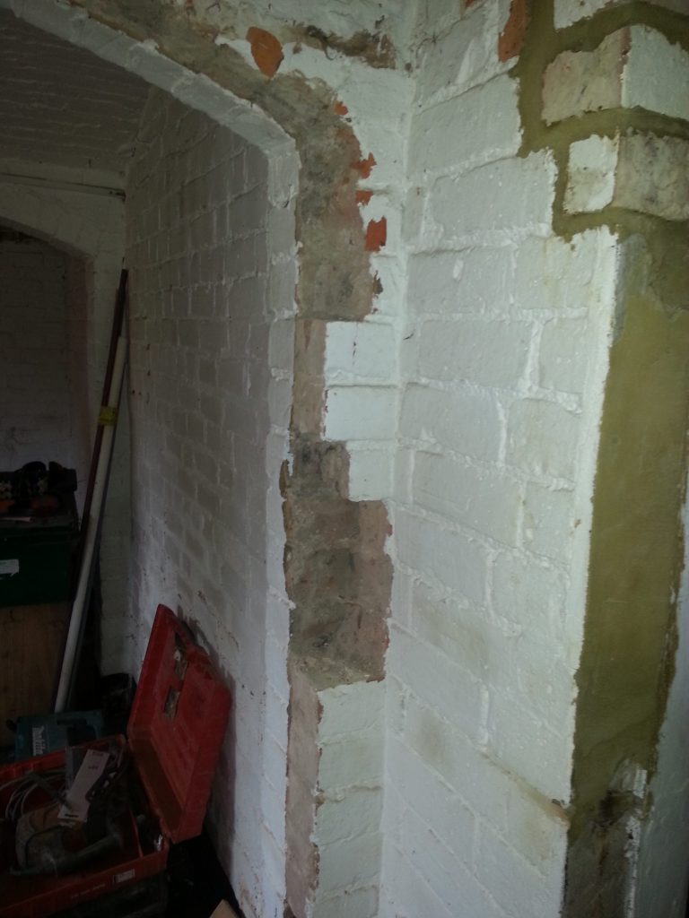 All brickwork painted white and some in need of repairs