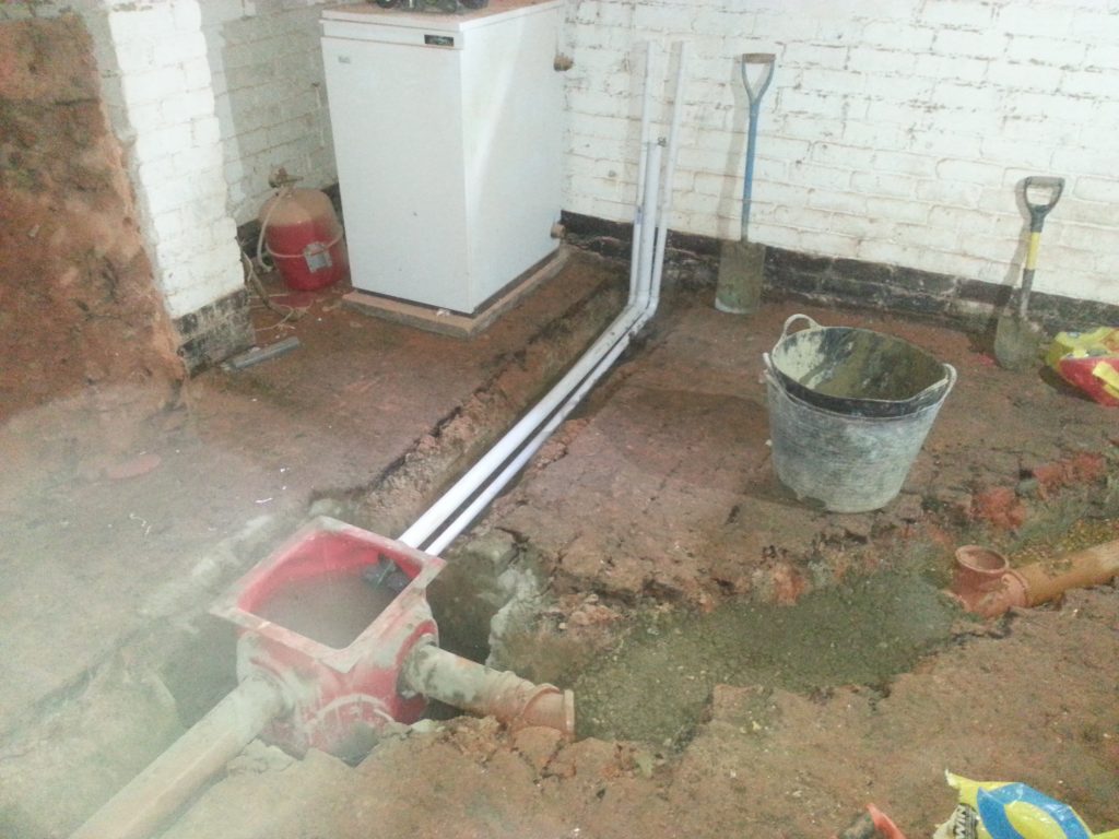 Discharge and power pipes for the sump along with underground drainage to carry water