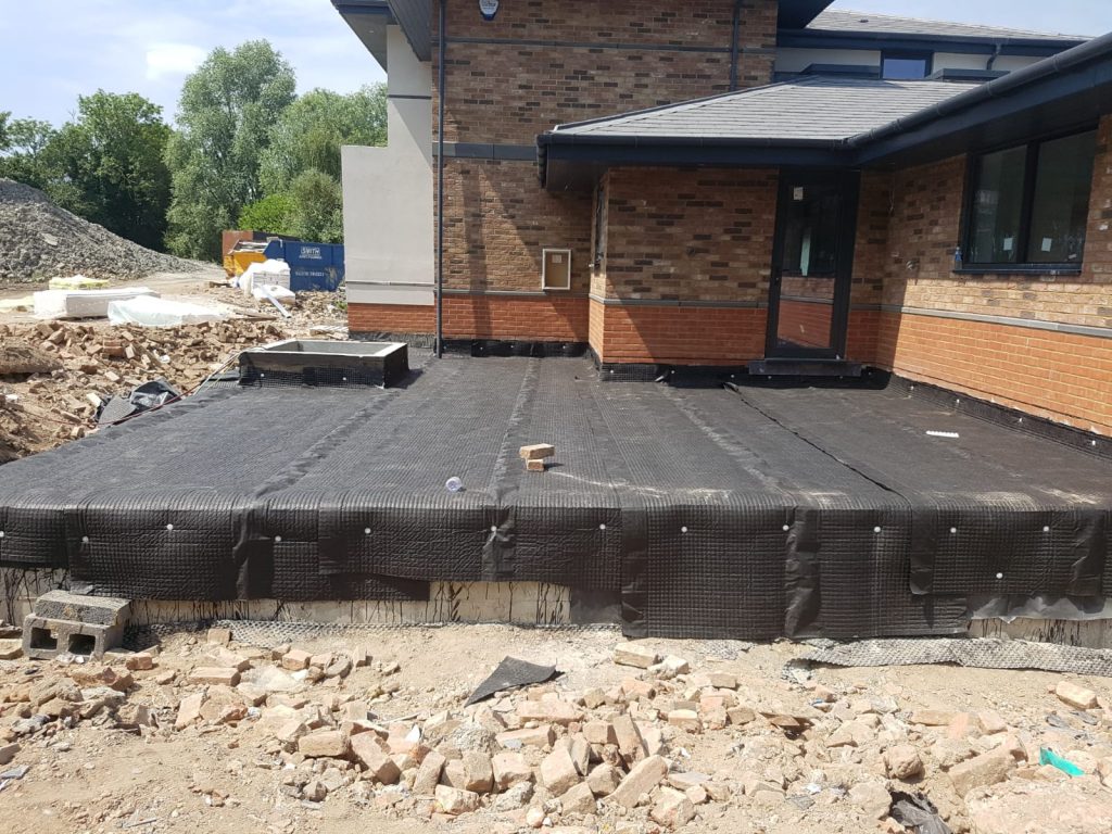 Protective drainage membrane the allows patio finishes to be installed without piercing the bitumen below