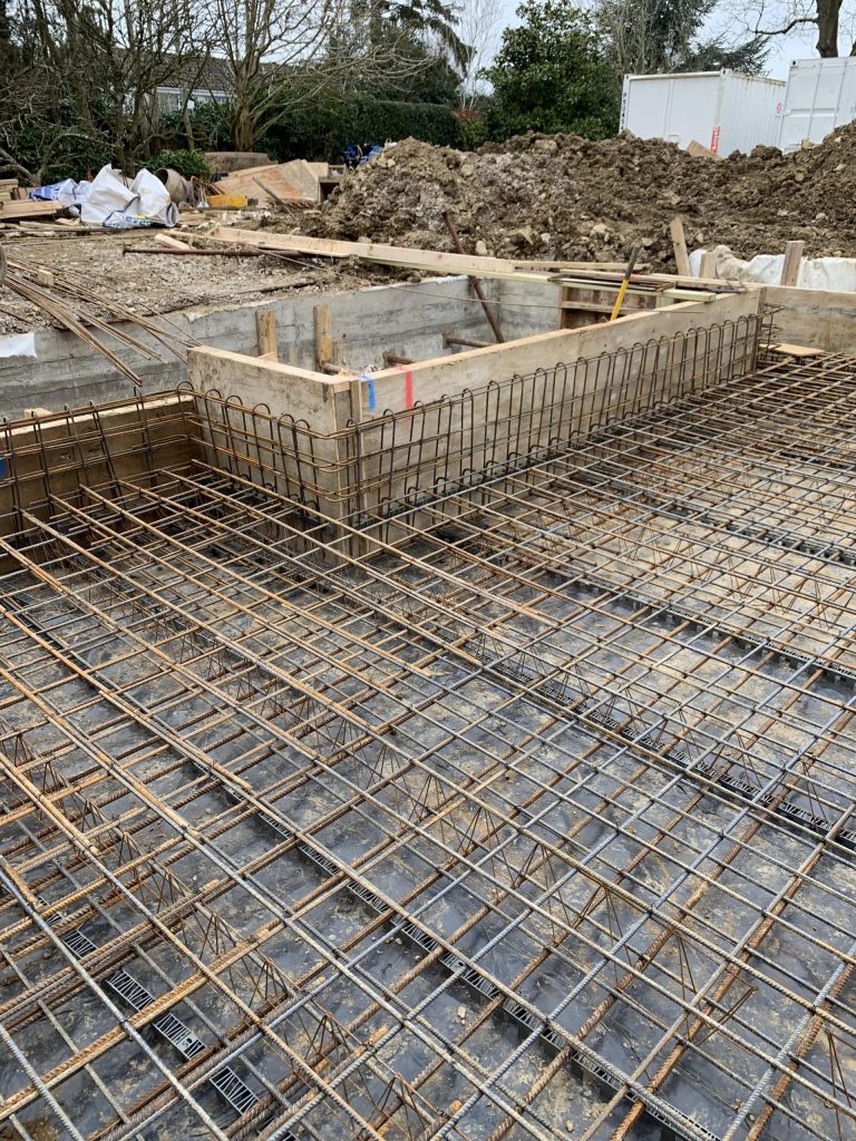 Pile cap beam and ground floor slab connected