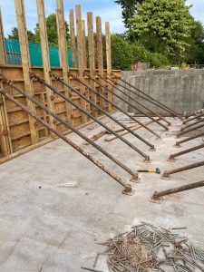 Upper slab walls supported
