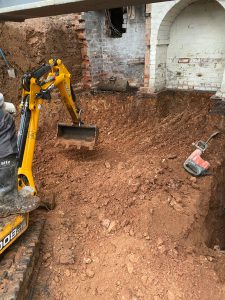 Excavating under existing house