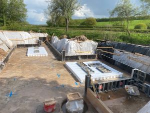 Insulation under main floor sections